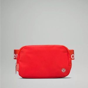 Lululemon Everywhere Belt Bag solar orange/white logo NWT